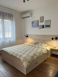 Postel nebo postele na pokoji v ubytování Apartman Sita