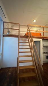 Ein Etagenbett oder Etagenbetten in einem Zimmer der Unterkunft Apartamento Lu Maison