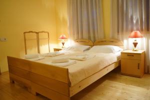Postel nebo postele na pokoji v ubytování Guest House Goari