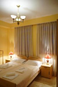 Postel nebo postele na pokoji v ubytování Guest House Goari