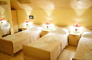 Postel nebo postele na pokoji v ubytování Guest House Goari