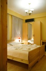 Postel nebo postele na pokoji v ubytování Guest House Goari