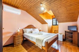 Кровать или кровати в номере Quinta da Carvalha