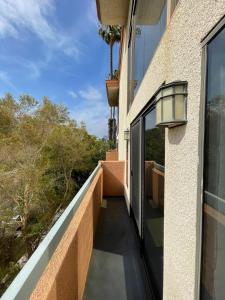 a balcony with a view of a house at *WEHO/Beverly Hills* Luxury 2BD/2.5BA + Balconies in Los Angeles