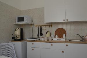 Kuchyň nebo kuchyňský kout v ubytování B&B La Meta
