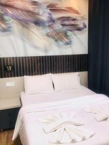Katil atau katil-katil dalam bilik di Bonita Hotel