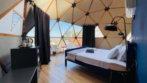 Postel nebo postele na pokoji v ubytování Bodrum Dome Suites