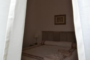 Postel nebo postele na pokoji v ubytování B&B La Meta