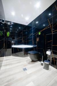 Ванная комната в Coloris Aureus room