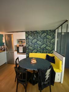 Η κουζίνα ή μικρή κουζίνα στο Chambre privée à 12 mn de Paris - Maison de ville +8 φωτογραφίες