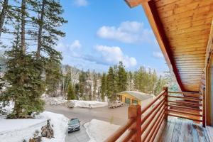 a winter view from the porch of a cabin at Juniper Junction in Park City