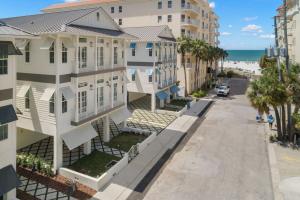 an aerial view of a street in front of buildings at Pearl House at The Gemma by Brightwild in Clearwater Beach