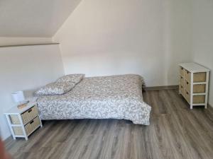 Postel nebo postele na pokoji v ubytování Appartement au milieu des vignes