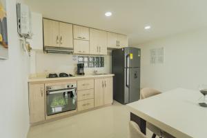 Η κουζίνα ή μικρή κουζίνα στο Apartamento RED DUPLEX en PINARES