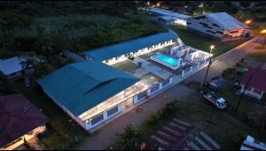 an overhead view of a building with a swimming pool at TARPON LODGE PARISMINA in Jaloba