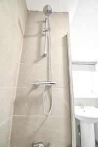 a bathroom with a shower and a sink at Keith House Workstays UK 4 Bedrooms in Middlesbrough