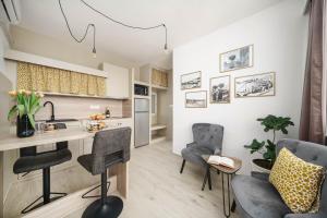 Кухня или мини-кухня в Apartment Remy
