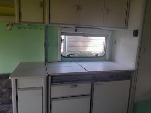 Kuchyň nebo kuchyňský kout v ubytování Caravan Vlinder
