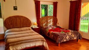 Postel nebo postele na pokoji v ubytování Quinta con alberca + 26 fotografií