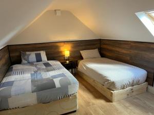 Cama ou camas em um quarto em Jacob’s Lodge