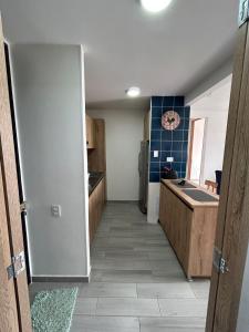 Kuchyň nebo kuchyňský kout v ubytování Reserva Del Peñon