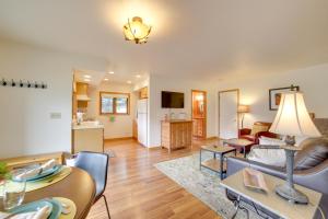 a living room with a couch and a table at Mountain-View Apt - 6 Mi to Ouray Hot Springs! in Ridgway