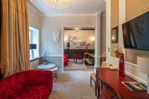 TV a/nebo společenská místnost v ubytování Hotel Pałac Alexandrinum