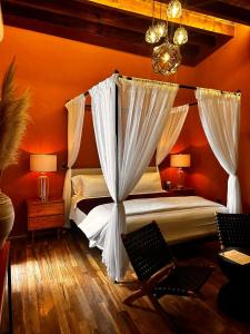 Postel nebo postele na pokoji v ubytování Bito's Hotel Boutique + 37 fotografií