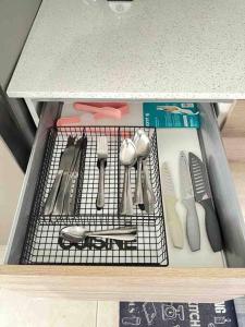 a drawer filled with lots of kitchen utensils at Beautifull 2 bedroom, 2 full washroom in Guatemala