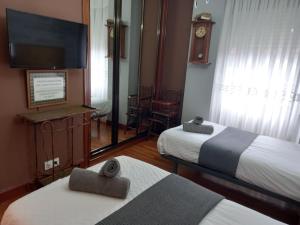 Кровать или кровати в номере Diego's Vintage Apartment