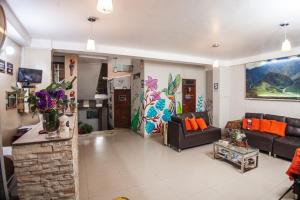 Posezení v ubytování RUMIQOLQA Machupicchu Hotel