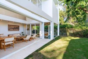 Κήπος έξω από το Hermosa Palms, Casa Lorenzo Beach Front Club House