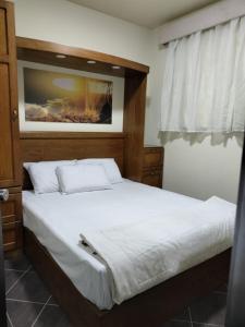 Krevet ili kreveti u jedinici u objektu Porto Matroh Tours