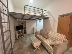 Et tv og/eller underholdning på RgHOST-Apartamento La Palma en Casco Histórico