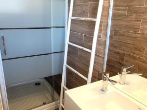 a bathroom with a sink and a shower at Appartement Les Gets, 3 pièces, 6 personnes - FR-1-598-30 in Les Gets