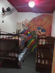 Двухъярусная кровать или двухъярусные кровати в номере Casa do Carnaval