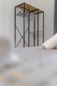 A bed or beds in a room at Arados family Residence
