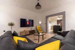 A television and/or entertainment centre at Arados family Residence