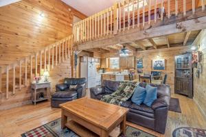 a living room with a couch and a table at Mountain Bliss in Townsend