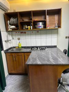 Η κουζίνα ή μικρή κουζίνα στο B&B apartments