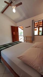 Uma cama ou camas num quarto em Hospedagem Donalu - Vale do Capão