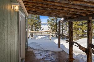 a winter view from the porch of a cabin at Dreamcatcher in West Yellowstone