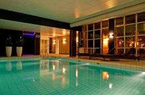 Bazén v ubytování Golden Tulip Ampt van Nijkerk nebo v jeho okolí