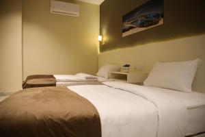 Postel nebo postele na pokoji v ubytování Regal view Aparthotel