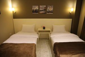 Postel nebo postele na pokoji v ubytování Regal view Aparthotel