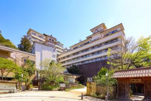 a large building in the middle of a street at Ooedo Onsen Monogatari Premium Yamashitaya in Kaga +45 photos