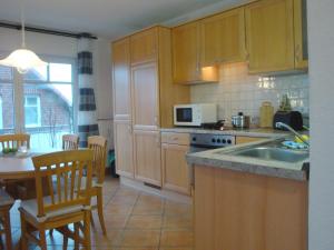 Кухня или мини-кухня в Haus Tante Clara Seglerkoje, Whg 6, Kukshörner Weg 8a
