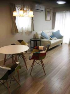 Khu vực ghế ngồi tại Maizon de Aile Room A