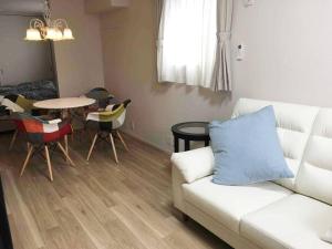Khu vực ghế ngồi tại Maizon de Aile Room A