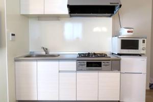 Nhà bếp/bếp nhỏ tại Maizon de Aile Room A